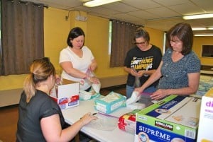 volunteers helping at food pantry